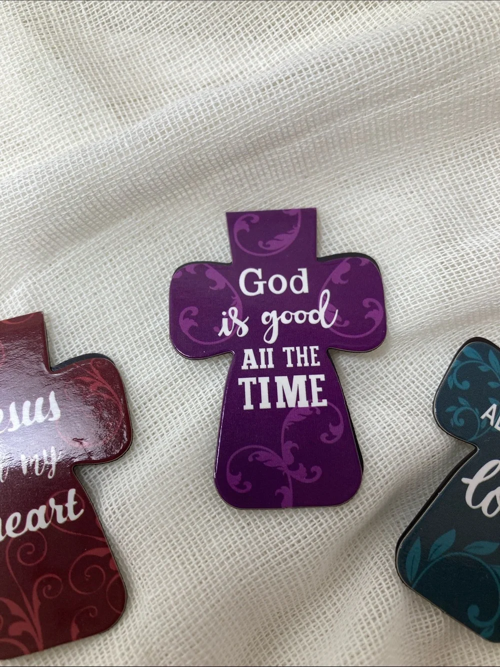 Magnetic cross shaped inspirational bookmarks.